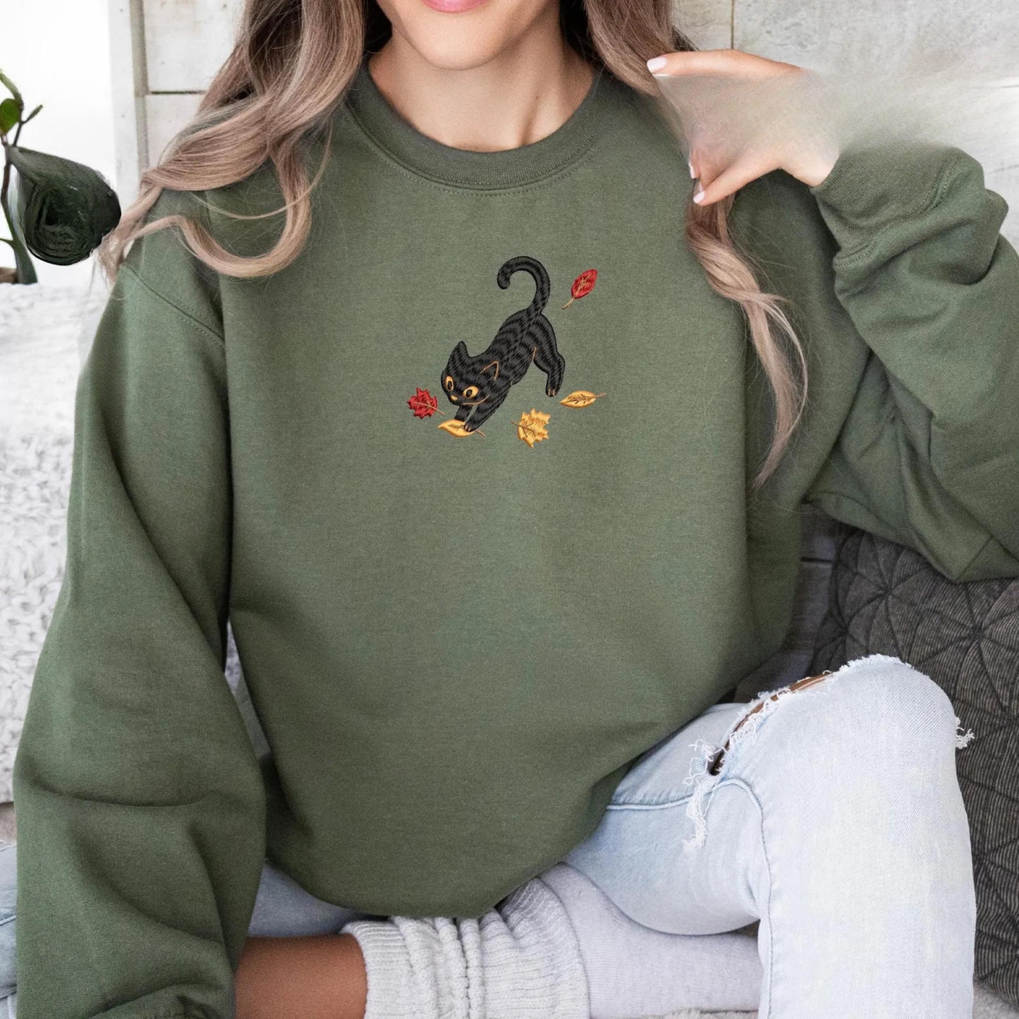 Black Cat Pouncing Autumn Leaves Sweater